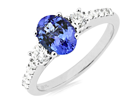 Oval tanzanite ring with diamond accents.