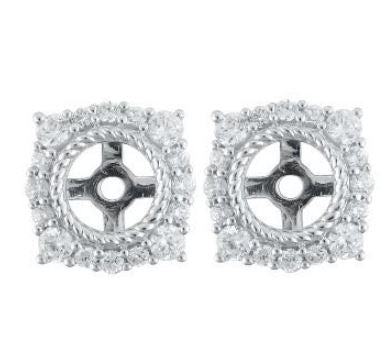 Diamond jackets with round diamonds in white gold.