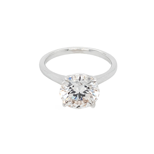 Solitaire lab-grown diamond engagement ring.