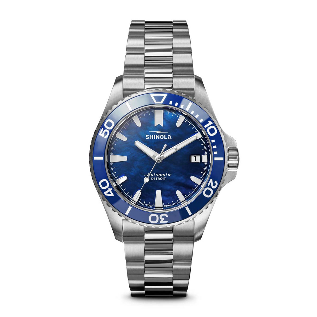 Blue mother of pearl dial watch.
