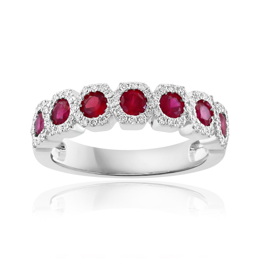 Seven round rubies in white gold band.