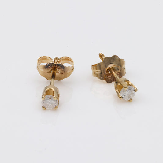14K yellow gold diamond stud earrings.