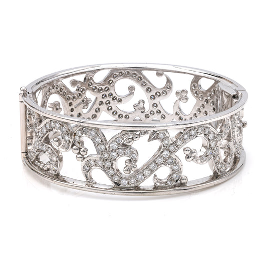 Intricate diamond filigree bracelet in white gold.