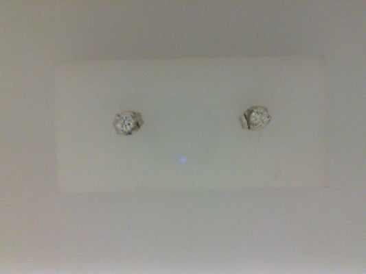 Diamond studs in white gold setting.