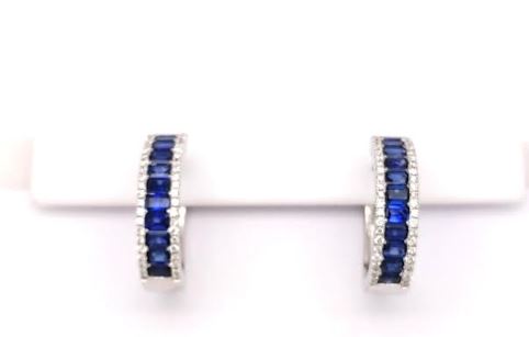 Emerald sapphire and diamond hoop earrings.