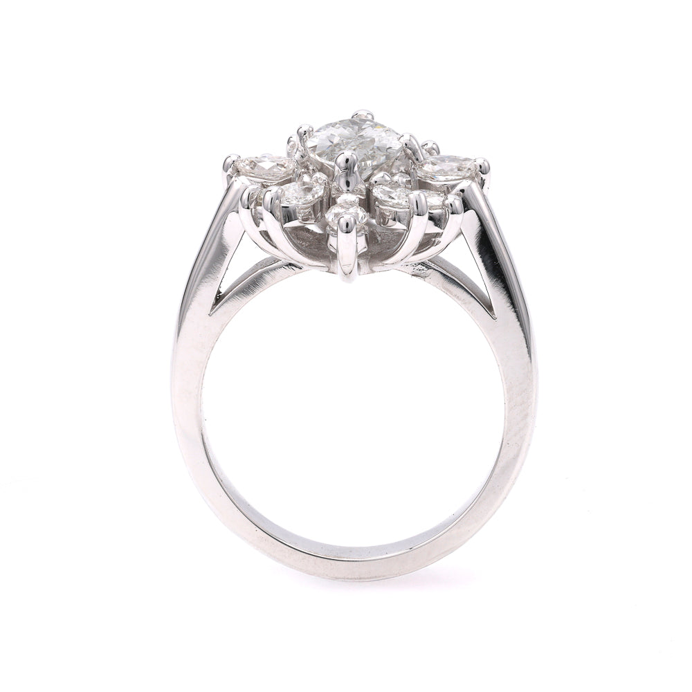 14K white gold ring with marquise diamonds.