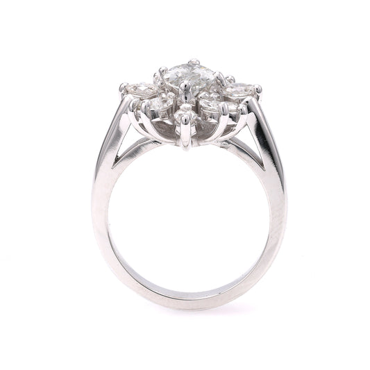 14K white gold ring with marquise diamonds.