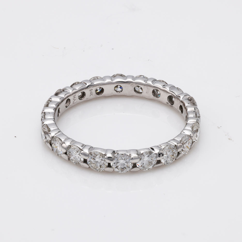 14K white gold diamond eternity ring.