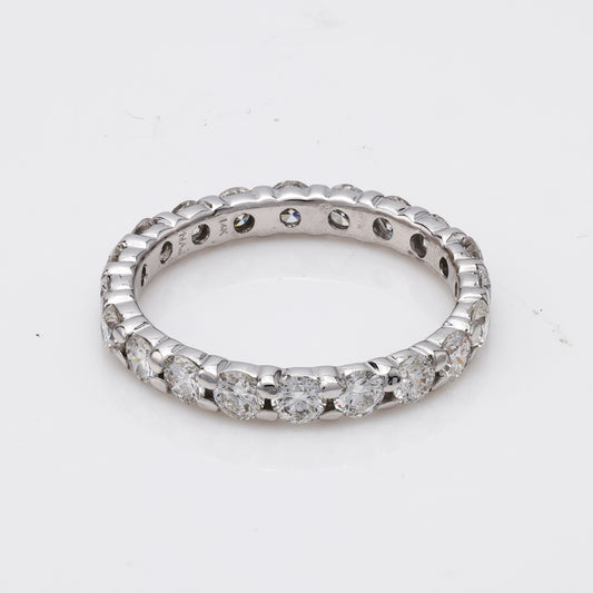 14K white gold diamond eternity ring.