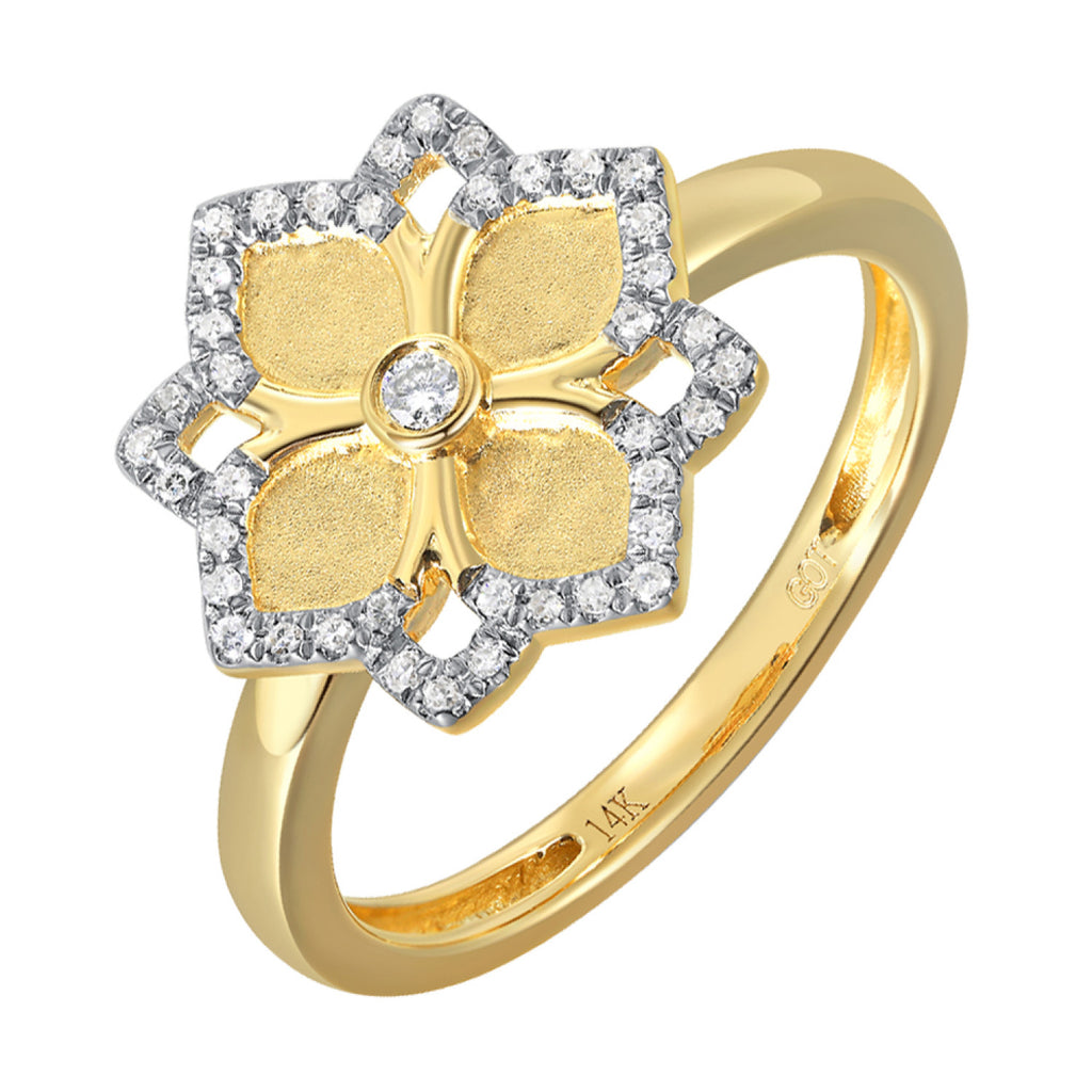 Yellow gold ring with diamond floral design.