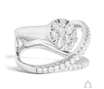 Diamond cluster ring with swirling band design.