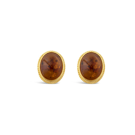 Amber cabochon earrings in yellow gold.