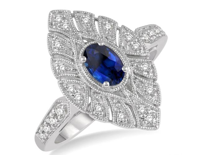 Oval sapphire ring with diamond accents.