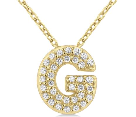 Gold initial necklace with round diamonds.