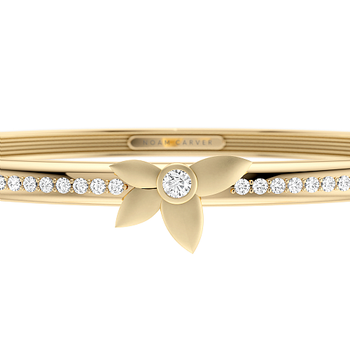 Yellow gold bracelet with round diamonds.