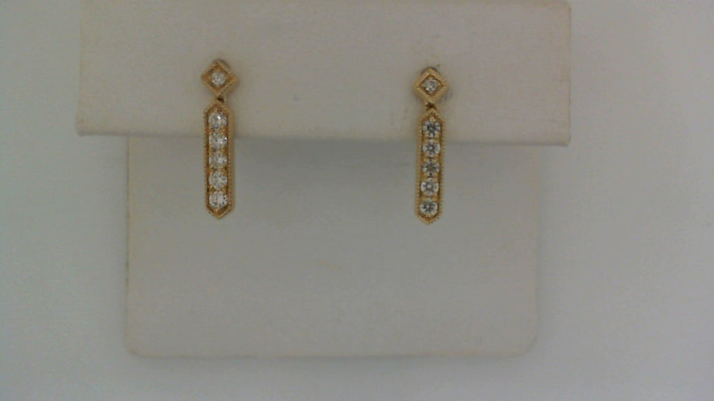 Diamond earrings in yellow gold with diamonds.