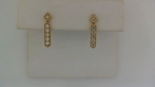 Diamond earrings in yellow gold with diamonds.