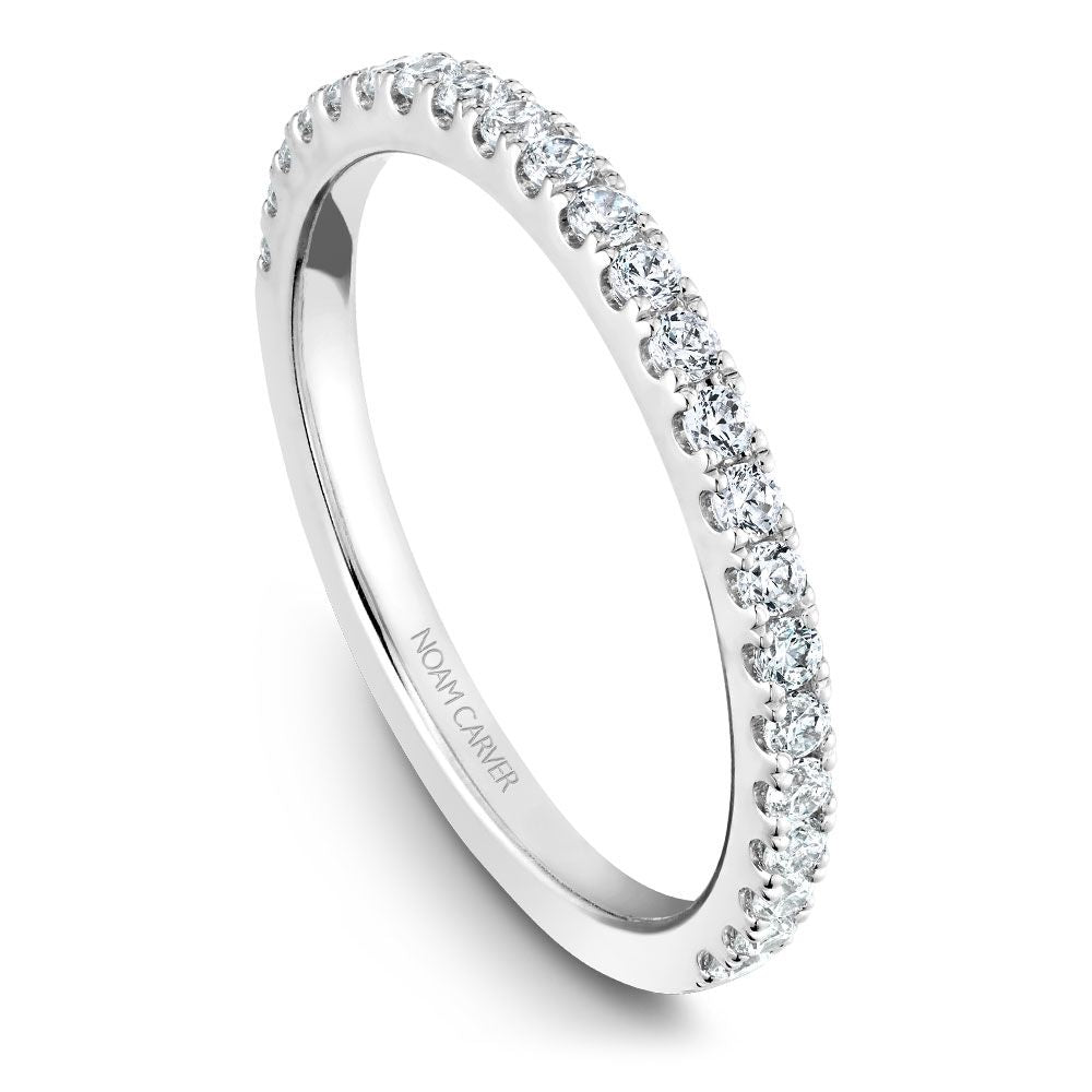Diamond band with round stones in white gold.