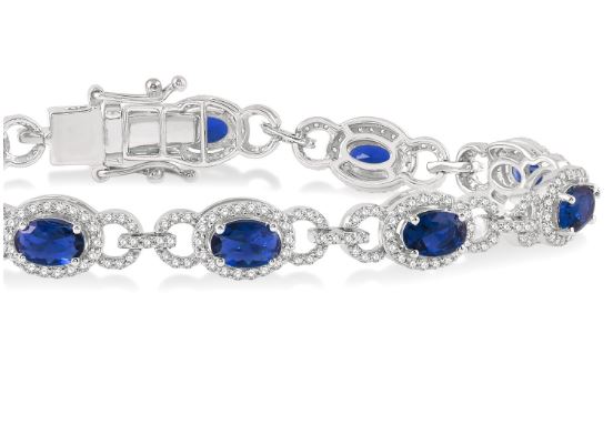 Oval sapphire and diamond station bracelet.