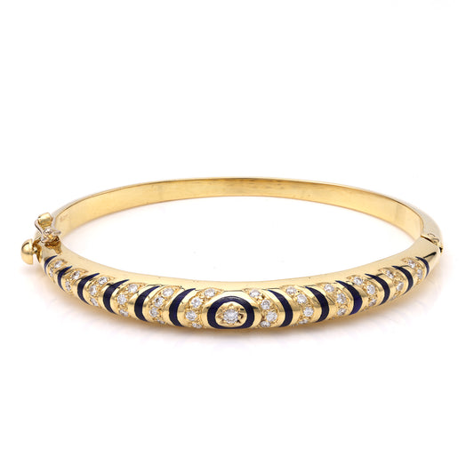 18K yellow gold bracelet with round diamonds.
