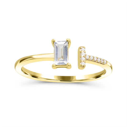 Yellow gold ring with baguette white topaz.