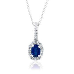 Oval sapphire necklace with diamond accents.
