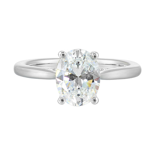Oval diamond ring in white gold setting.