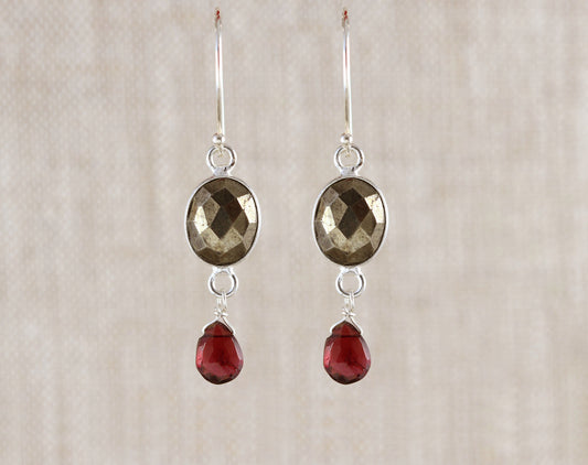 Sterling silver earrings with pyrite and garnet.