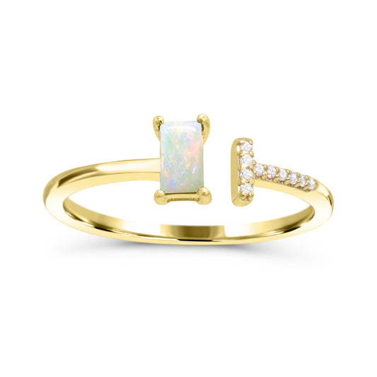 Rectangular opal ring with diamonds in gold.