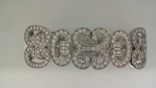 Intricate diamond bracelet with scroll design.
