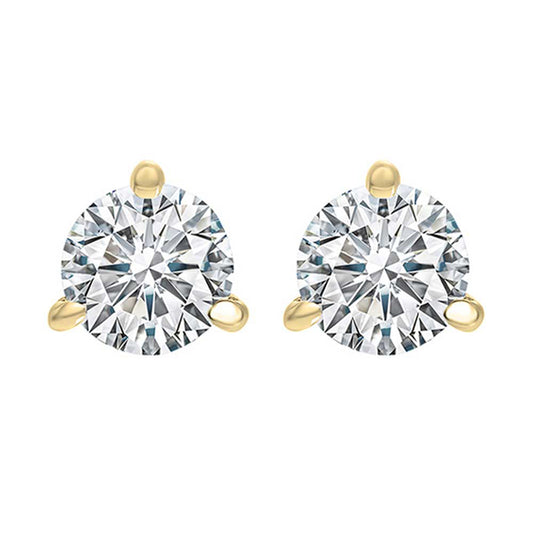 Round diamond studs with yellow gold prongs.