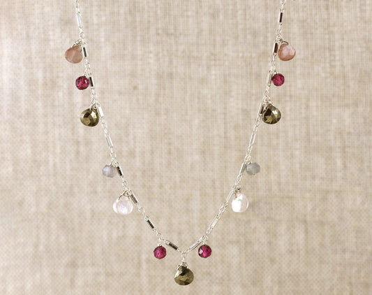 Sterling silver necklace with colorful gemstones.