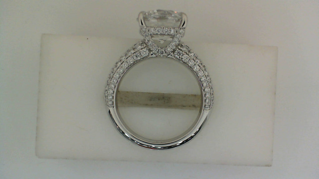 18K white gold ring with side diamonds.