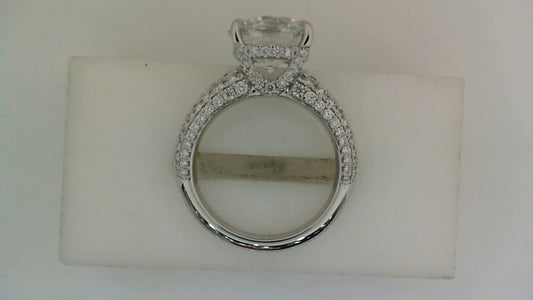 18K white gold ring with side diamonds.