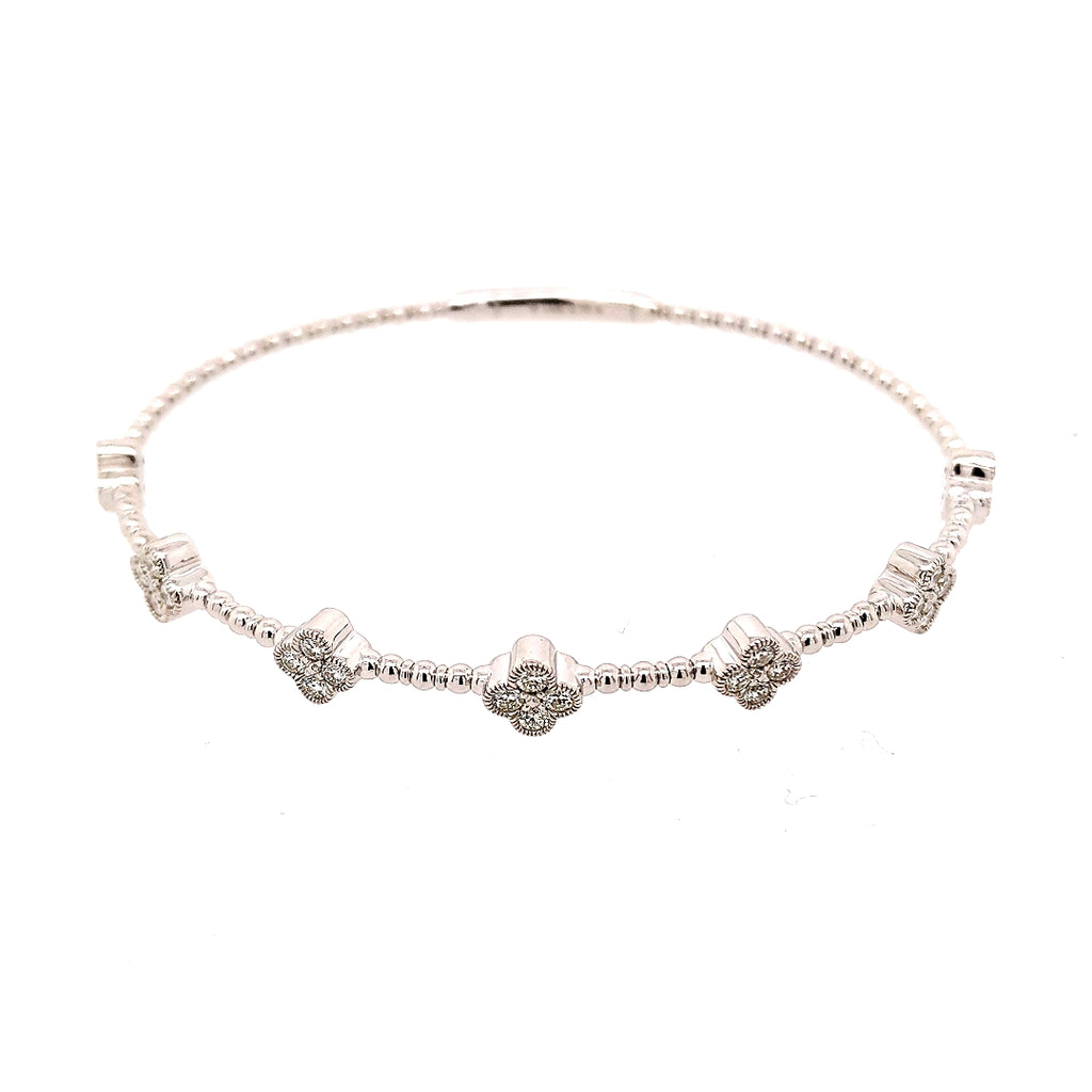 14K white gold bracelet with diamond clusters.