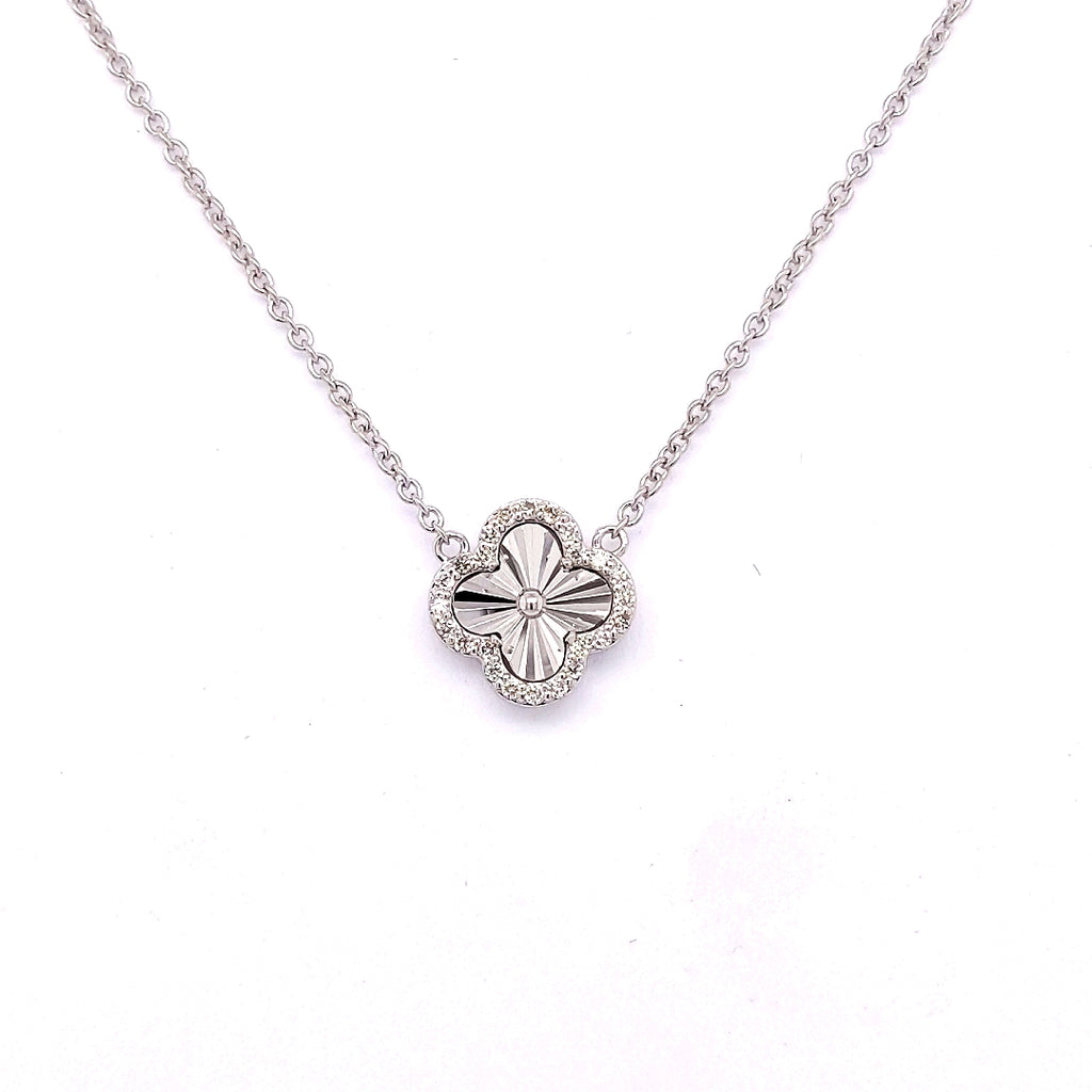 Clover design diamond necklace in white gold.