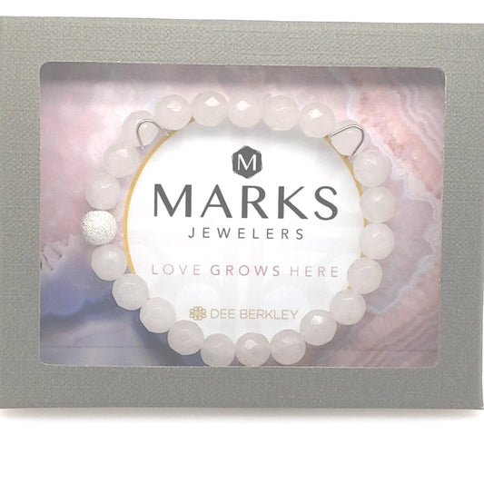 White gemstone bracelet with textured silver bead.