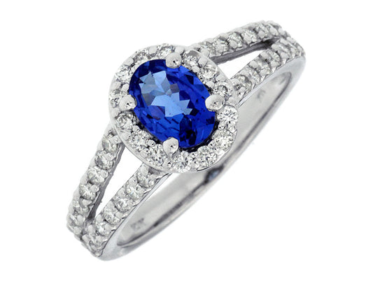 Oval tanzanite ring with diamond accents.