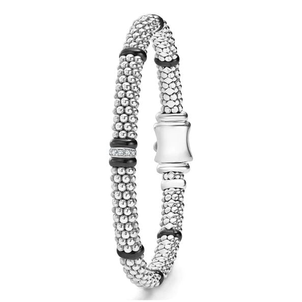 Sterling silver bracelet with diamond accents.