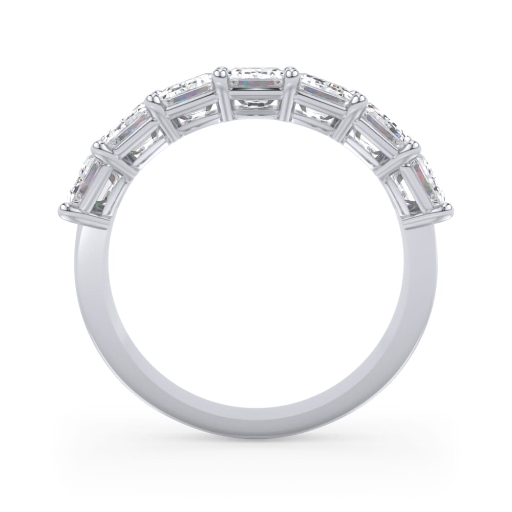 Emerald diamond wedding band in white gold.