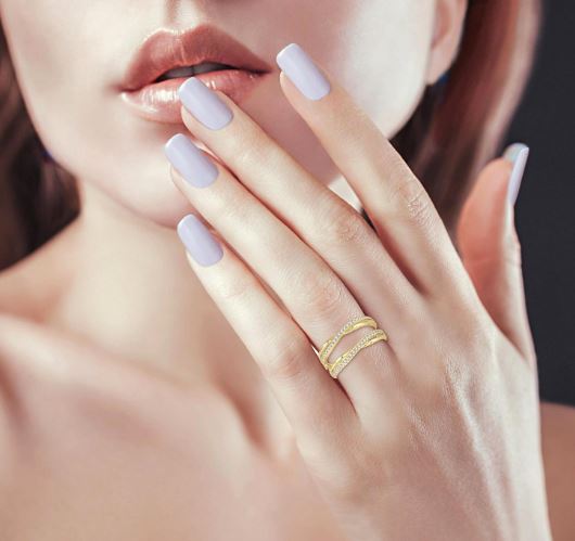 Yellow gold band with round diamond accents.