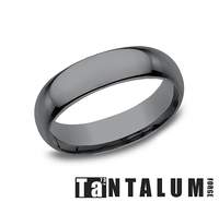 Dark grey tantalum carved band, polished finish.