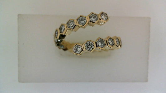 Hexagonal diamond ring in yellow gold.