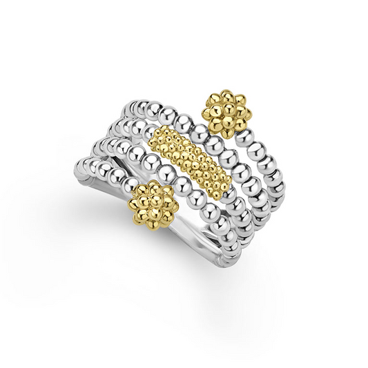 Sterling silver ring with gold bead accents.