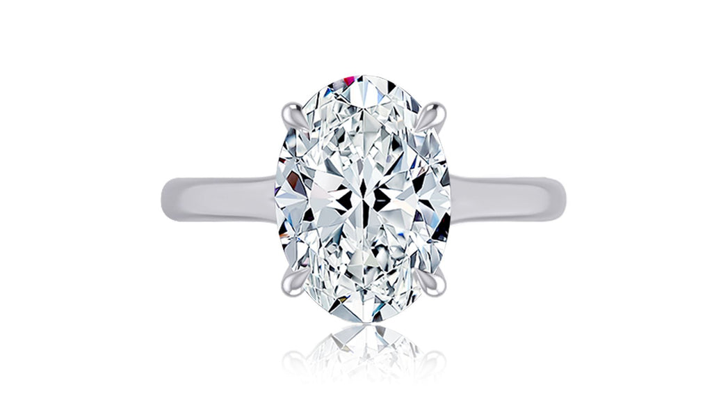 Oval diamond ring in white gold setting.