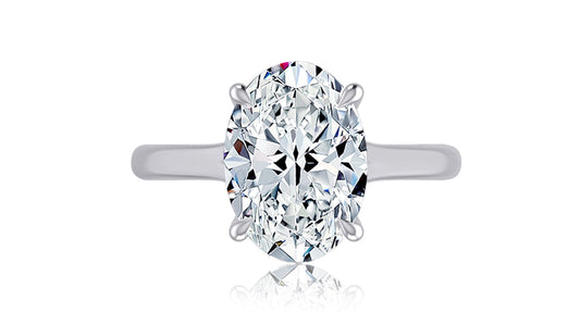 Oval diamond ring in white gold setting.