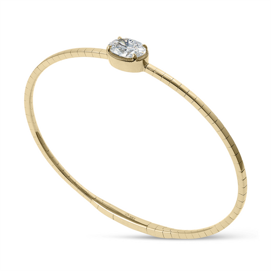 18K yellow gold bracelet with oval diamond.