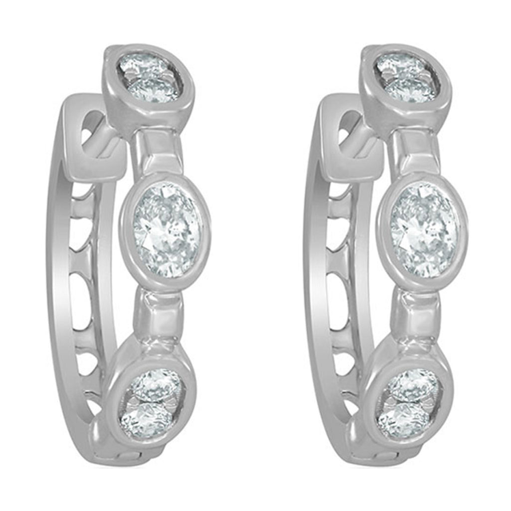 White gold hoop earrings with diamonds.