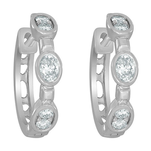 White gold hoop earrings with diamonds.