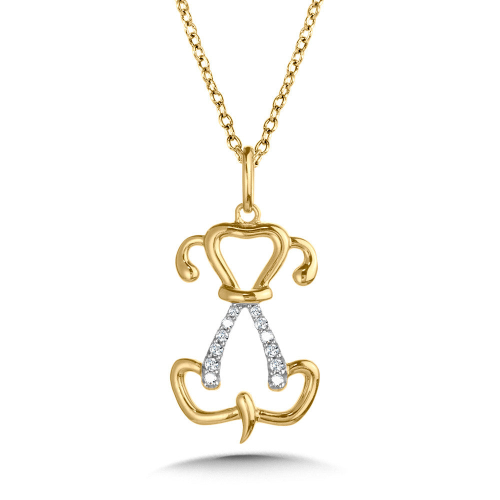 Yellow gold necklace with diamond-accented pendant.